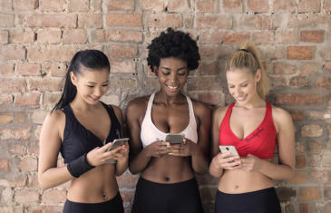 Technology Women In Workout Gear Smartphone Column