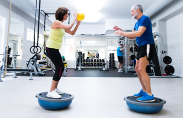 Senior Couple In Gym Working Out Listing Image